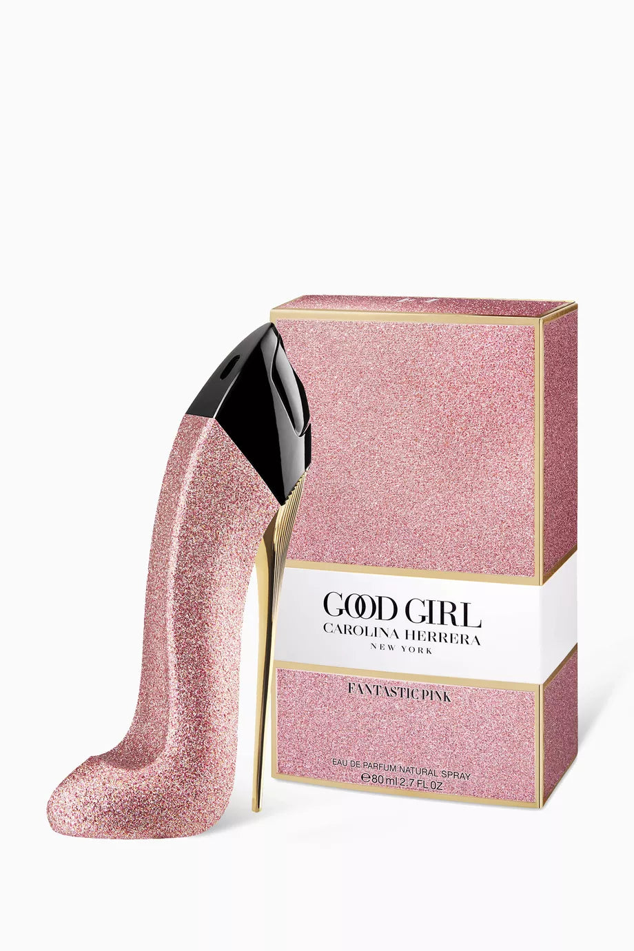 Pink glitter high heel shoe with 'Good Girl' perfume box on a white background