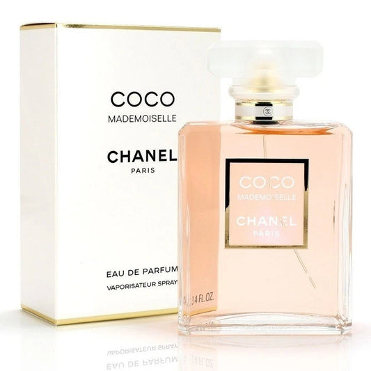 Chanel Coco Mademoiselle perfume bottle and packaging on a white background