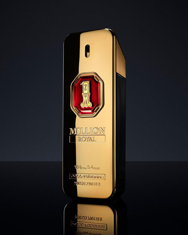 Gold and red perfume bottle with 'Milion Royal' branding on a black background